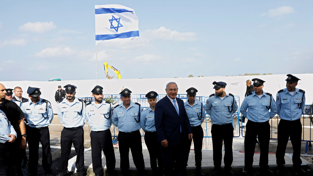 ISRAEL-POLITICS/ Israeli Prime Minister Benjamin Netanyahu attends the inauguration ceremony of a police station in the Arab-Israeli town of Jisr ez-Zarqa November 21, 2017. REUTERS/Ronen Zvulun - RC1BFB9D0670