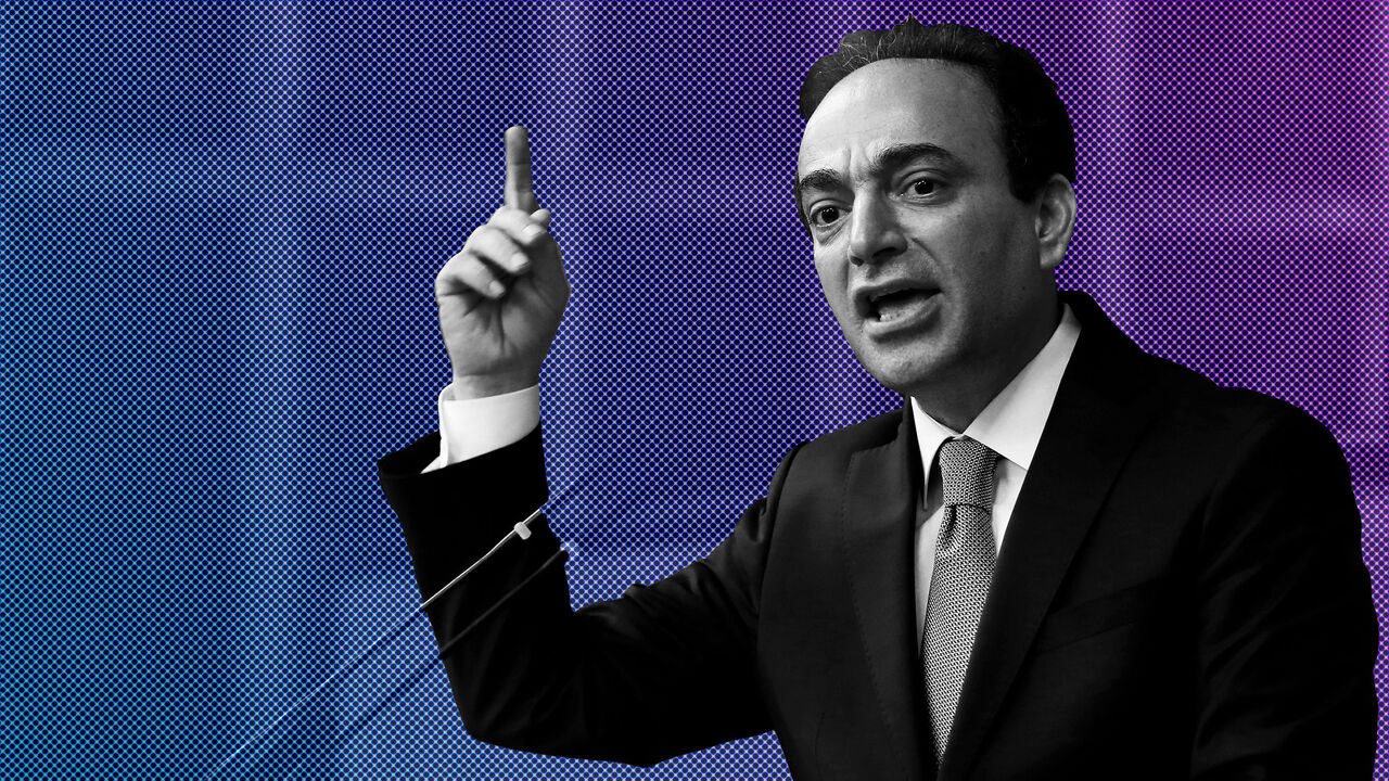 FILE PHOTO: Osman Baydemir, spokesman for the Peoples' Democratic Party (HDP), addresses members of parliament from his party during a meeting at the Turkish parliament in Ankara, Turkey April 18, 2017. Picture taken April 18, 2017. REUTERS/Umit Bektas/File Photo - RC1730D15E80