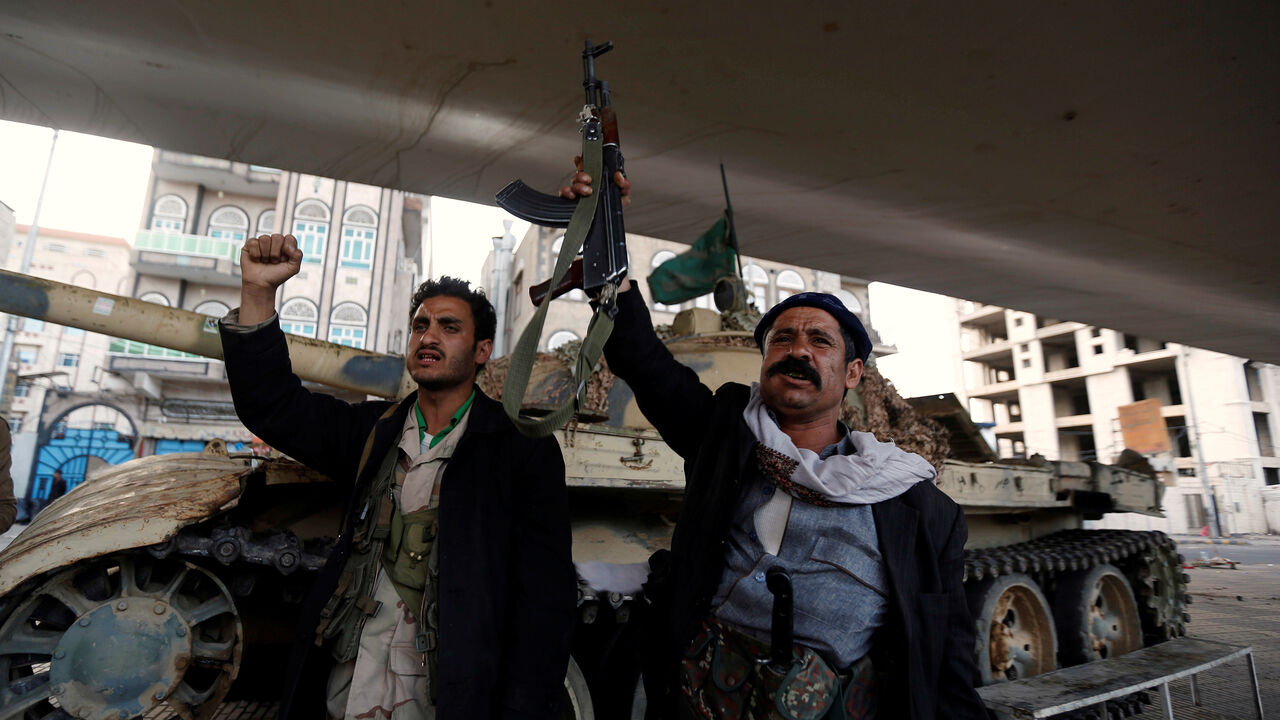 YEMEN-SECURITY/SALEH Houthi fighters react after Yemen's former president Ali Abdullah Saleh was killed, in Sanaa, Yemen December 4, 2017. REUTERS/Khaled Abdullah - RC1993369A90