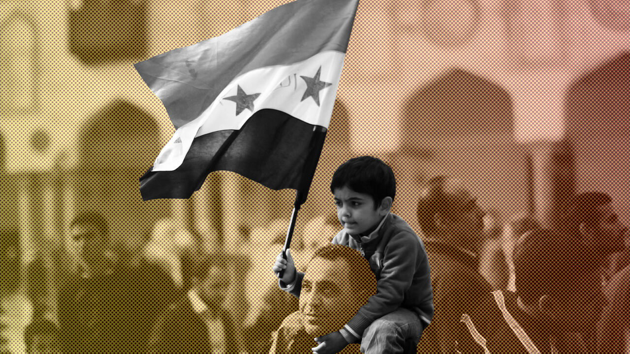 Nic6169658 A Syrian man carries his son during a rally in support of the Syrian people and against Syria's President Bashar al-Assad at Al-Azhar mosque in Cairo, on December 28, 2012. Syrian warplanes launched air raids in Damascus province after overnight bombardments and clashes across the country, the Syrian Observatory for Human Rights said. AFP PHOTO/MAHMUD HAMS (Photo credit should read MAHMUD HAMS/AFP/Getty Images)