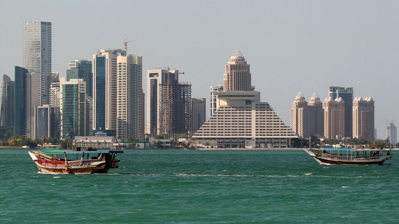 GULF-QATAR/ Buildings are seen on a coast line in Doha, Qatar June 5, 2017. REUTERS/Stringer - RC19BDD1CE80