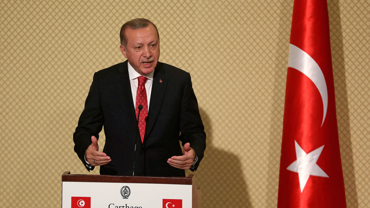 TURKEY-TUNISIA / Turkey's President Tayyip Erdogan speaks during a news conference with Tunisia's President Beji Caid Essebsi (not pictured) at Carthage Palace in Tunis, Tunisia, December 27, 2017. REUTERS/Zoubeir Souissi - RC1C0962BF30
