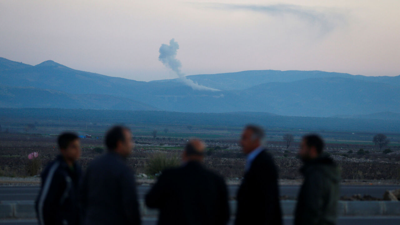 MIDEAST-CRISIS/SYRIA-TURKEY Smoke rises from the Syria's Afrin region, as it is pictured from near the Turkish town of Hassa, on the Turkish-Syrian border in Hatay province, Turkey January 20, 2018. REUTERS/Osman Orsal - RC1E9965CD20