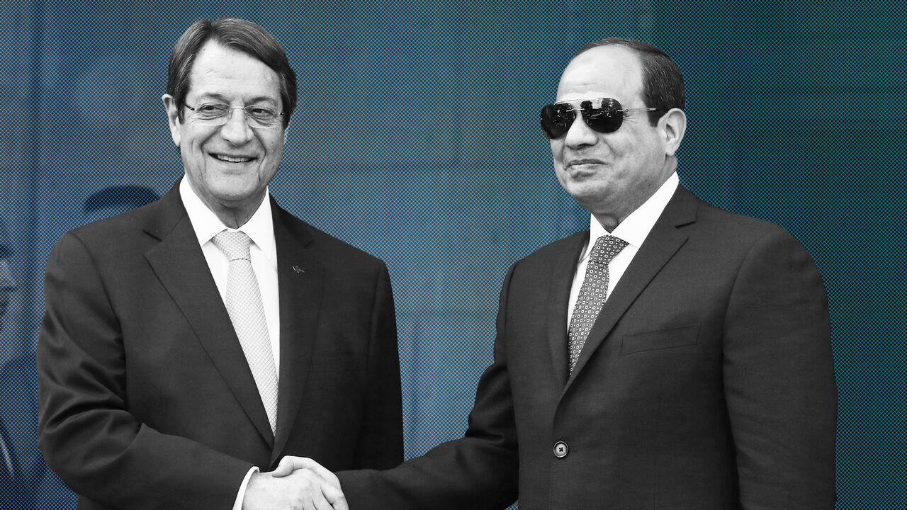 CYPRUS-GREECE/EGYPT Egyptian President Abdel Fattah al-Sisi and Cypriot President Nicos Anastasiades shake hands outside the Presidential Palace in Nicosia, Cyprus November 21, 2017. REUTERS/Yiannis Kourtoglou - RC1CEEA6B170