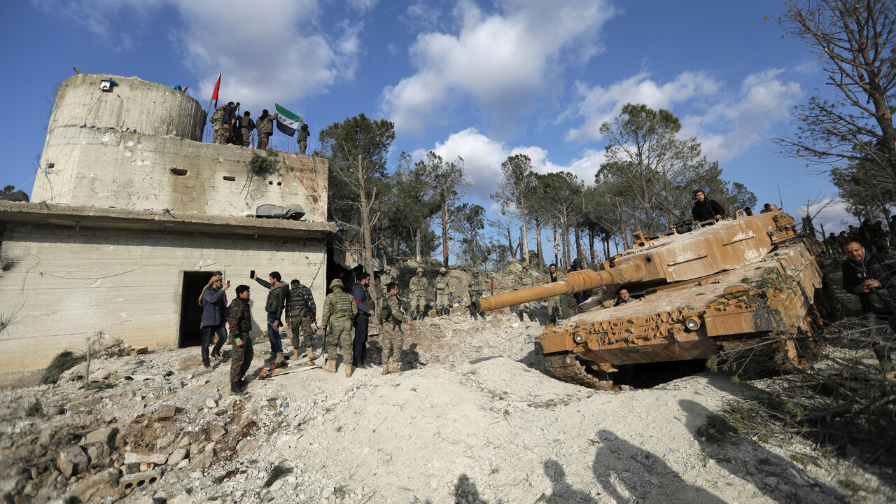 MIDEAST-CRISIS/SYRIA-TURKEY Turkish forces and Free Syrian Army members are seen on Mount Barsaya, northeast of Afrin, Syria January 28, 2018. REUTERS/ Khalil Ashawi - RC12885992C0