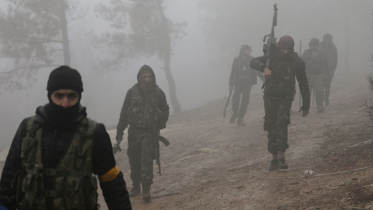 MIDEAST-CRISIS/SYRIA-TURKEY Turkish-backed Free Syrian Army fighters are seen near Mount Barsaya, northeast of Afrin, Syria January 23, 2018. REUTERS/Khalil Ashawi - RC17FC1FEC20