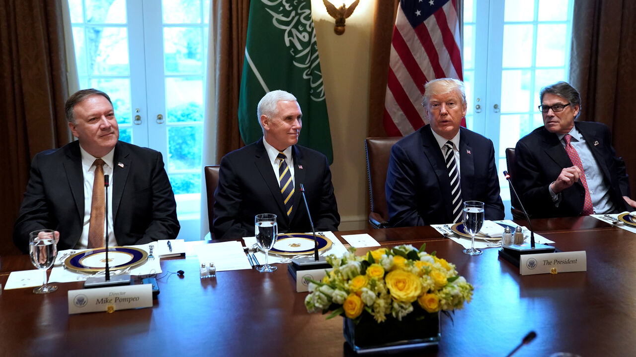 USA-SAUDI/ U.S. President Donald Trump, flanked by Central Intelligence Agency (CIA) Director Mike Pompeo, ?Vice President Mike Pence? and Energy Secretary†Rick Perry, hosts Saudi Arabia's Crown Prince Mohammed bin Salman for a working lunch at the White House in Washington, U.S. March 20, 2018. REUTERS/Jonathan Ernst - RC12317C6820
