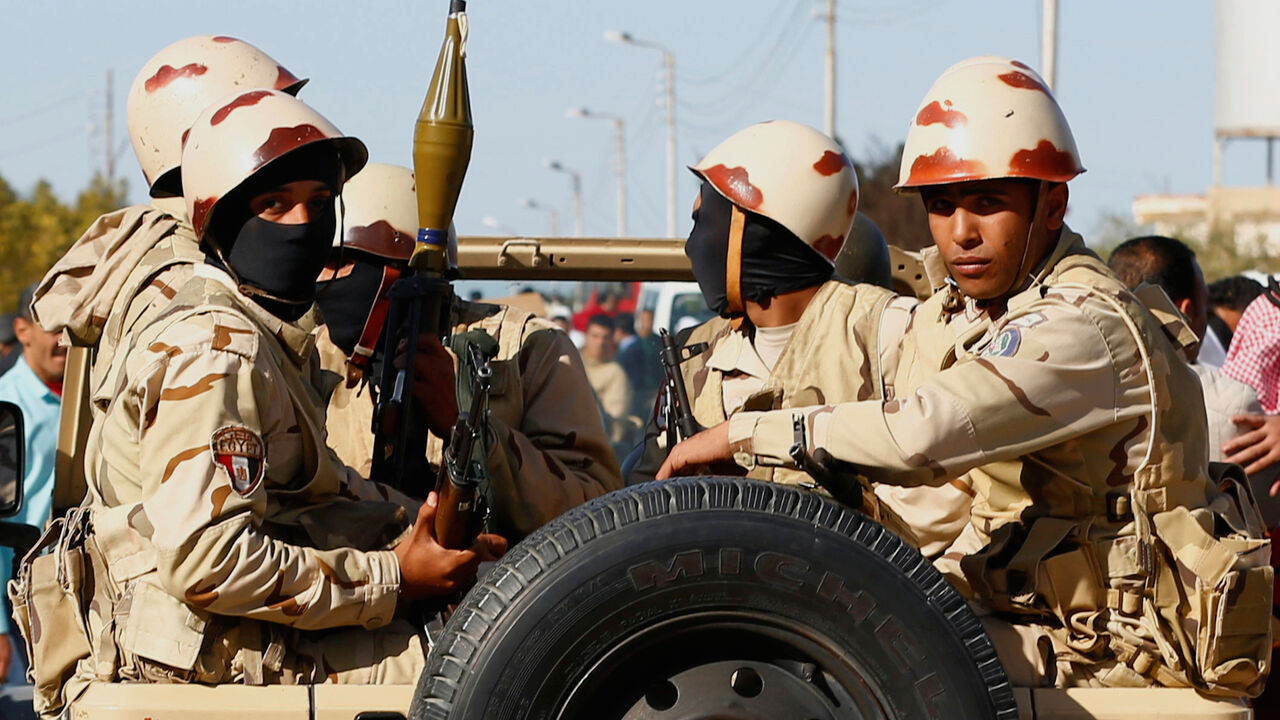 Military forces look on in North Sinai, Egypt, December 1, 2017. REUTERS/Mohamed Abd El Ghany - RC11222FB880