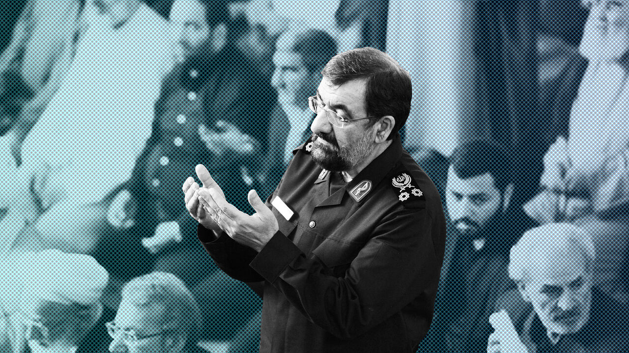 86172952 TEHRAN, IRAN - JULY 10: Mohsen Rezaei, a former Iranian Revolutionary Guard commander and two-time presidential candidate (in uniform), stands during Friday Prayers during a Qods (Jerusalem) Day rally, an annual pro-Palestinian event, in Tehran, Iran, on July 10, 2015. Rally-goers turned out in cities across Iran, chanting "Death to America" and "Death to Israel," as Iran negotiates the final rounds of a nuclear deal with six world powers in Vienna, Austria. (Photo by Scott Peterson/Getty Images)