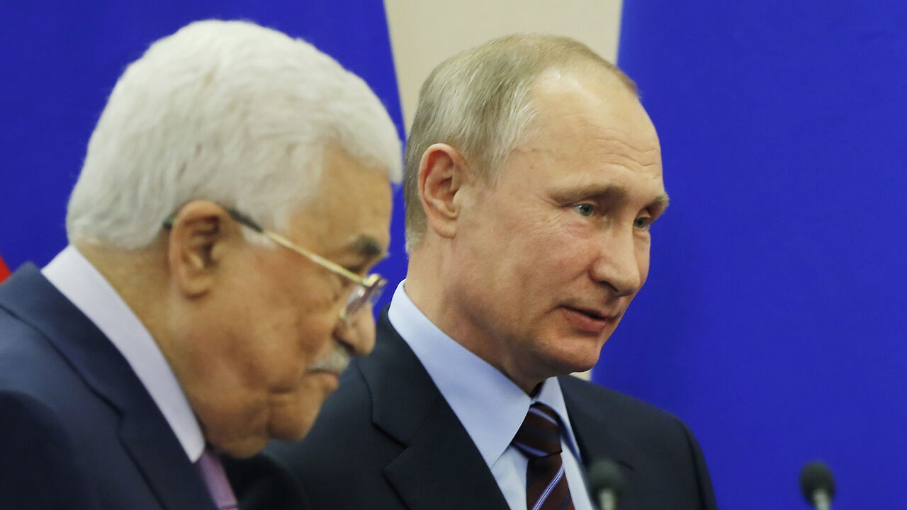 Russian President Vladimir Putin (R) and Palestinian leader Mahmud Abbas give a press conference following a meeting at the Bocharov Ruchei residence in the Black sea resort of Sochi on May 11, 2017. / AFP PHOTO / POOL / YURI KOCHETKOV        (Photo credit should read YURI KOCHETKOV/AFP/Getty Images)