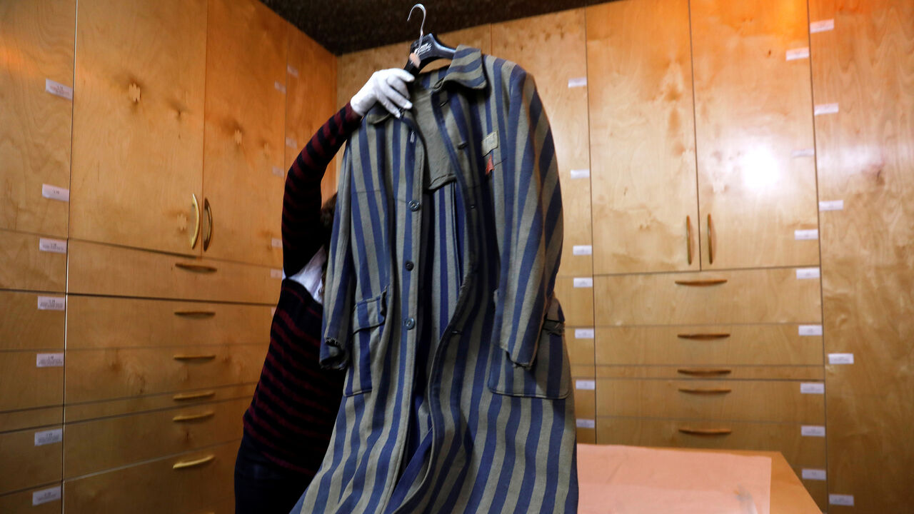 An original prisoner's coat (not on general display) is seen at the artifacts department of the Yad Vashem World Holocaust Remembrance Center in Jerusalem, ahead of the Israeli annual Holocaust Remembrance Day, April 10, 2018. Picture taken April 10, 2018. REUTERS/Ronen Zvulun - RC1A0B40CE00