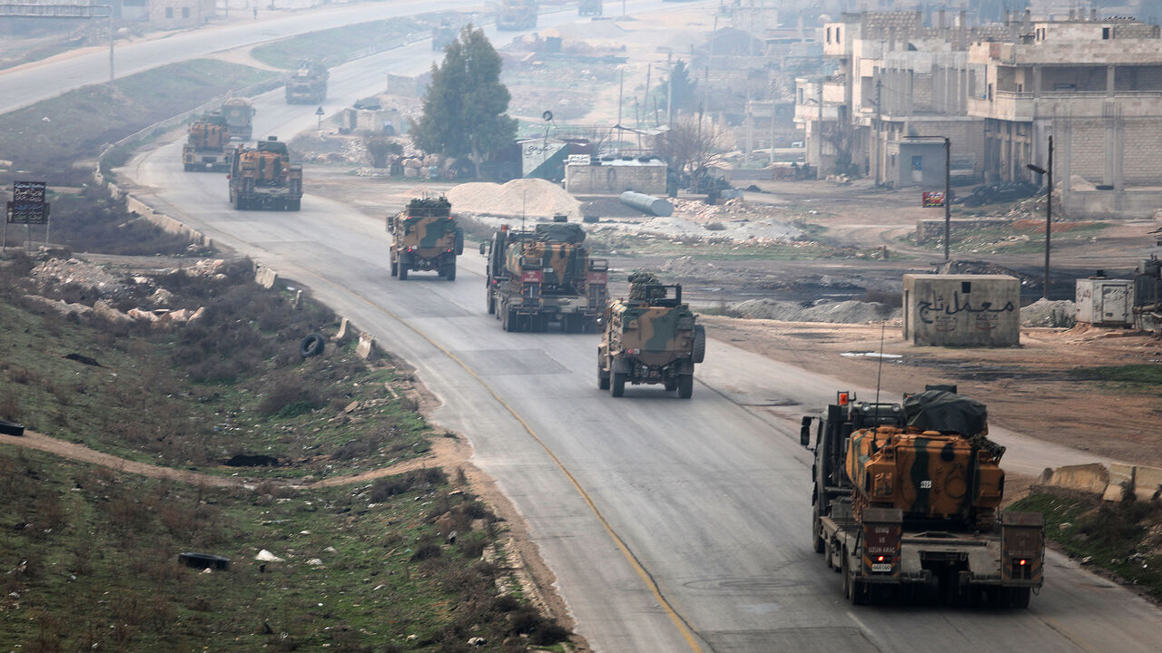 AFP_ZV5D5 A picture taken on February 15, 2018 shows a Turkish military convoy driving through Syria's northwestern Idlib province.
/ AFP PHOTO / OMAR HAJ KADOUR (Photo credit should read OMAR HAJ KADOUR/AFP/Getty Images)