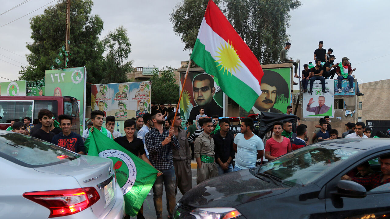 IRAQ-ELECTION/ Kurdish supporters of the Patriotic Union of Kurdistan (PUK) celebrate after the closing of ballot boxes during the parliamentary election in Kirkuk, Iraq, May 12, 2018. REUTERS/Ako Rasheed - RC1D42ED63F0