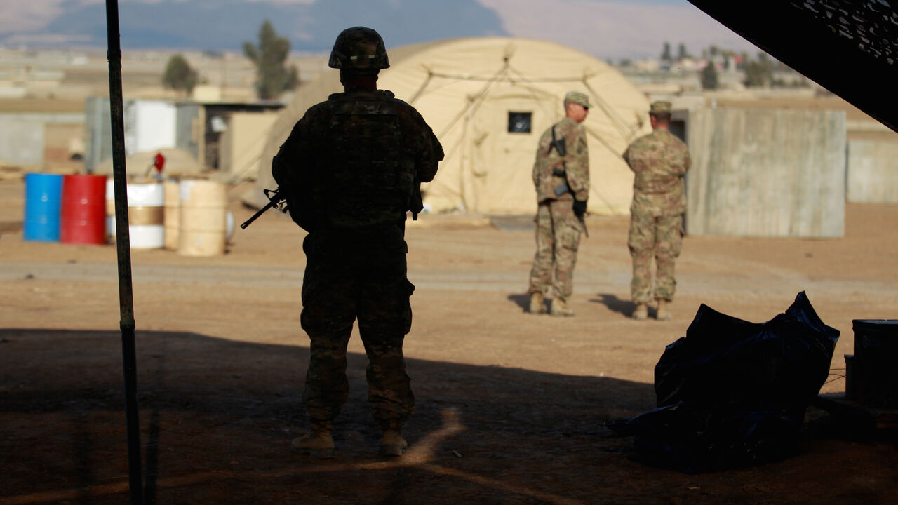 MIDEAST-CRISIS/IRAQ-USA-ARTILLERY A U.S. soldier from the 2nd Brigade, 82nd Airborne Division stands guard at a military base north of Mosul, Iraq, February 14, 2017. Picture taken February 14, 2017. REUTERS/Khalid al Mousily - RC1D165D9880