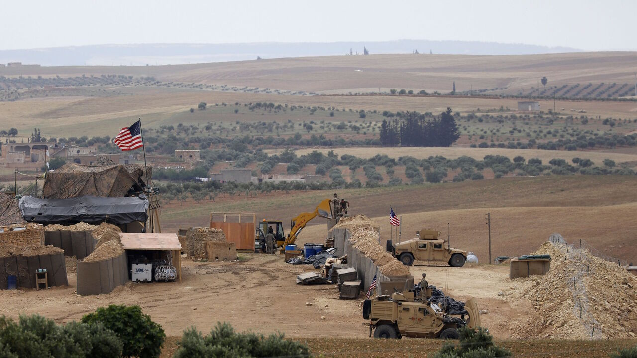 A picture taken on May 8, 2018 shows vehicles and structures of the US-backed coalition forces in the northern Syrian town of Manbij. - The Syrian Observatory for Human Rights, a Britain-based monitor with sources on the ground, says around 350 members of the US-led coalition -- mostly American troops -- are stationed around Manbij. (Photo by Delil souleiman / AFP)        (Photo credit should read DELIL SOULEIMAN/AFP/Getty Images)