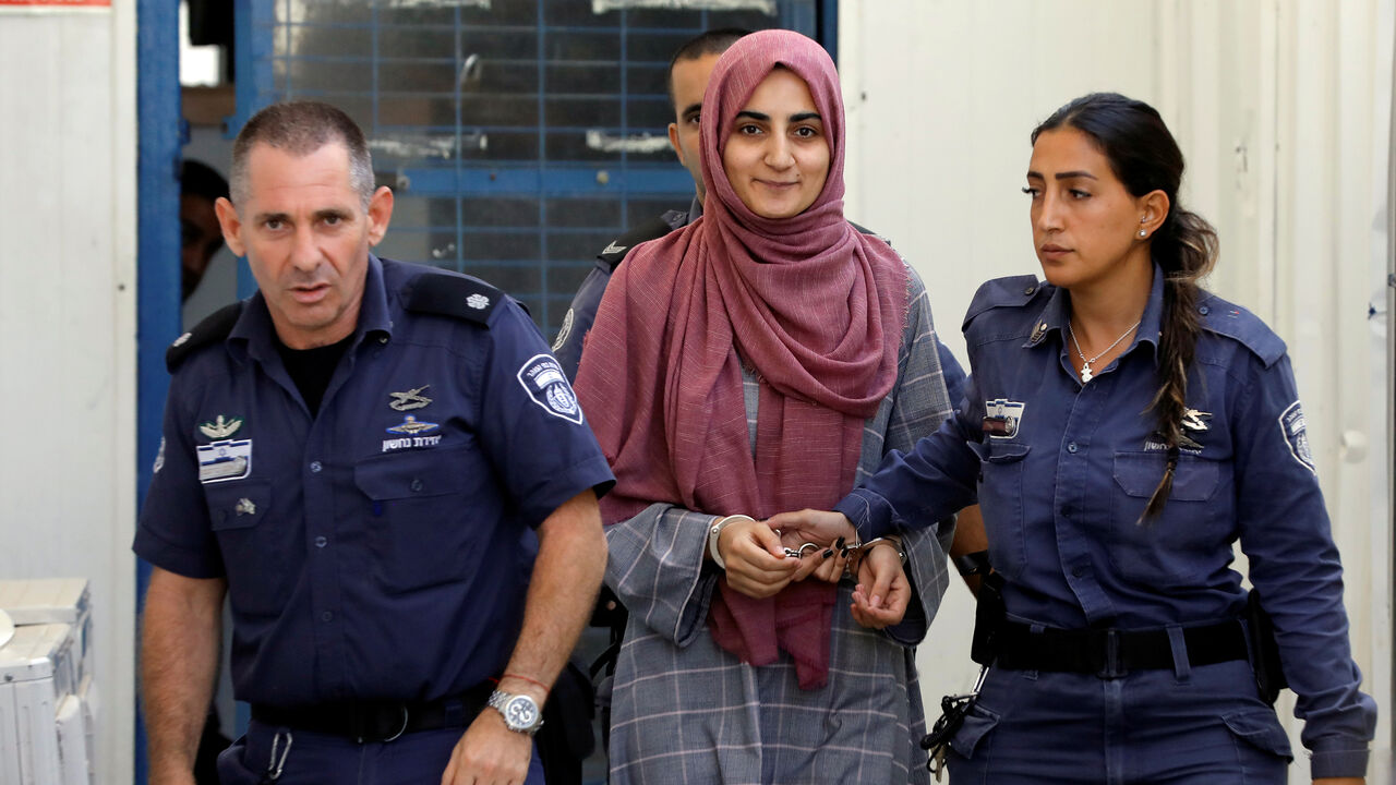 ISRAEL-PALESTINIANS/TURKEY Turkish citizen, Ebru Ozkan, who was arrested at an Israeli airport last month, is being brought to an Israeli military court, near Migdal, Israel July 8, 2018 REUTERS/Nir Elias - RC12410D5420
