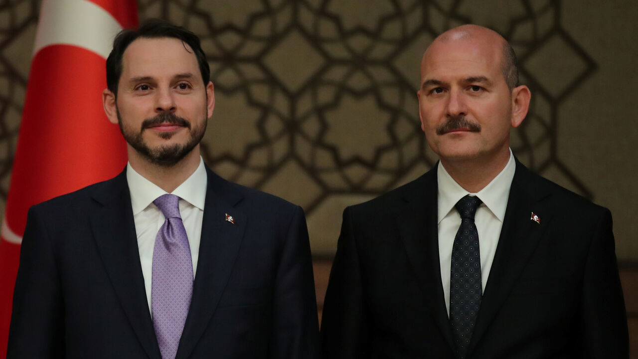 TURKEY-POLITICS/ERDOGAN-CABINET Turkish President Tayyip Erdogan's son-in-law and newly appointed Treasury and Finance Minister Berat Albayrak (L) and Interior Minister Suleyman Soylu stand next to each other during a presser at the Presidential Palace in Ankara, Turkey July 9, 2018. REUTERS/Umit Bektas - RC1A333464E0