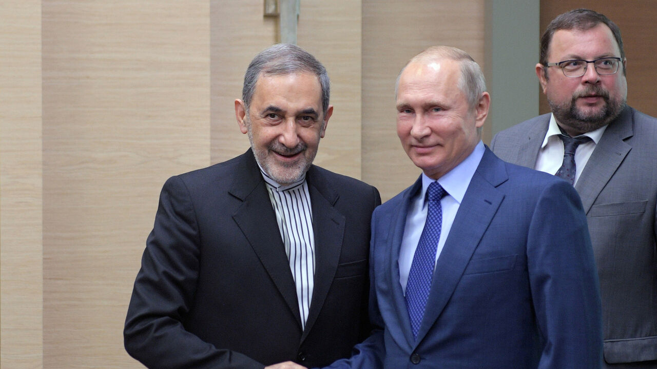 IRAN-NUCLEAR/RUSSIA Russian President Vladimir Putin shakes hands with Ali Akbar Velayati, a top advisor to Iran's Supreme Leader Ayatollah Ali Khamenei, during their meeting at the Novo-Ogaryovo state residence outside Moscow, Russia July 12, 2018. Sputnik/Alexei Druzhinin/Kremlin via REUTERS ATTENTION EDITORS - THIS IMAGE WAS PROVIDED BY A THIRD PARTY. - RC1122CD2770