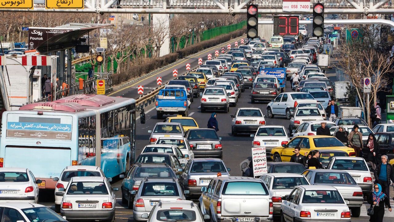 AFP_JY952 A picture taken on January 14, 2017 shows street traffic in the Iranian capital Tehran on the first anniversary of the nuclear agreement.
The first anniversary, of the nuclear deal between Iran and six powers, that lifted a large part of international sanctions on Iran in return for limits on Tehran's nuclear programme, comes four days before the inauguration of Republican president Trump on January 20. / AFP / ATTA KENARE (Photo credit should read ATTA KENARE/AFP/Getty Images)