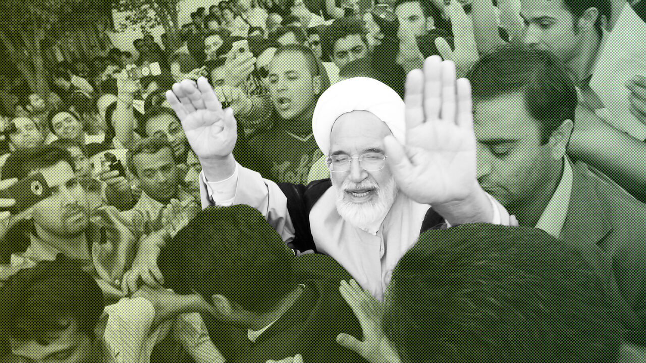 IRAN-ELECTION/ EDITORS' NOTE: Reuters and other foreign media are subject to Iranian restrictions on leaving the office to report, film or take pictures in Tehran.
Iran's presidential candidate Mehdi Karroubi (3rd R) joins a crowd of supporters in Tehran June 17, 2009. REUTERS/Demotix (IRAN POLITICS ELECTIONS CONFLICT) - GM1E56I0IW301