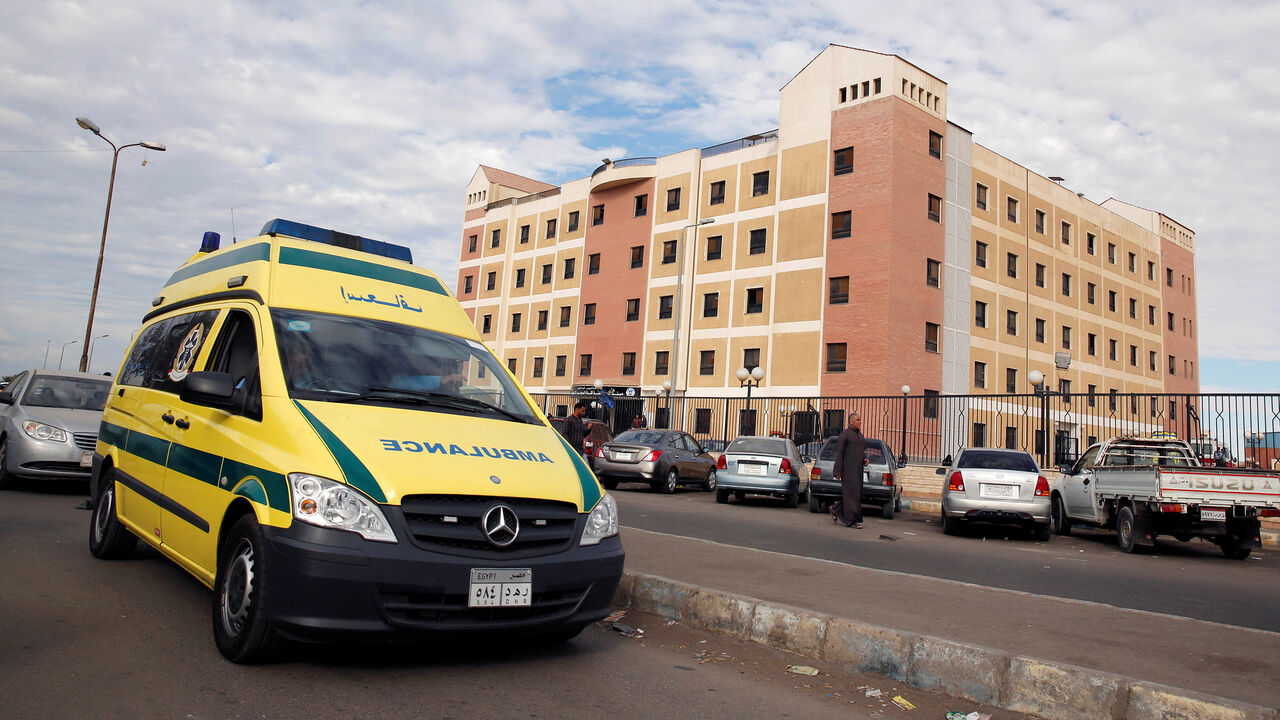 EGYPT-SECURITY/ An ambulance drives past the Suez Canal University hospital, where victims of the Al Rawdah mosque attack are being treated in Ismailia, Egypt November 25, 2017. REUTERS/Amr Abdallah Dalsh - RC1D4CB3B1D0
