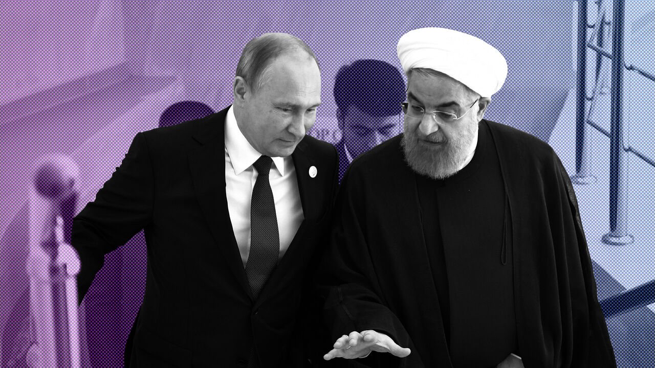 KAZAKHSTAN-CASPIAN/ Russian President Vladimir Putin and Iranian President Hassan Rouhani attend a meeting during the Fifth Caspian Summit in Aktau, Kazakhstan August 12, 2018. Sputnik/Alexei Nikolsky/Kremlin via REUTERS ATTENTION EDITORS - THIS IMAGE WAS PROVIDED BY A THIRD PARTY. - UP1EE8C1E0PP0
