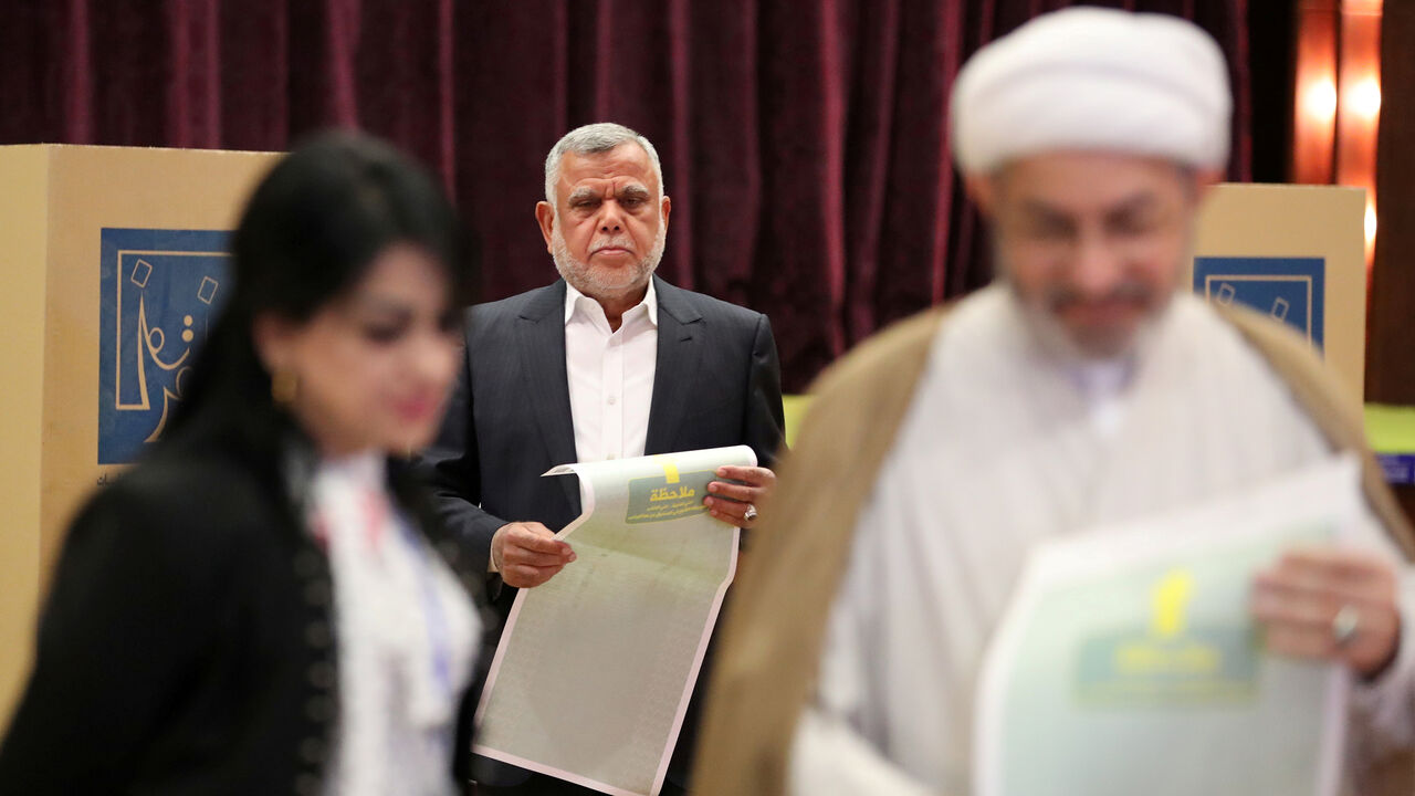 IRAQ-ELECTION/ Leader of the Conquest Coalition and the Iran-backed Shiíite militia Badr Organisation Hadi al-Amiri prepares to casts his vote at a polling station during the parliamentary election in Baghdad, Iraq May 12, 2018. REUTERS/Ahmed Jadallah TPX IMAGES OF THE DAY - RC1EA048C760