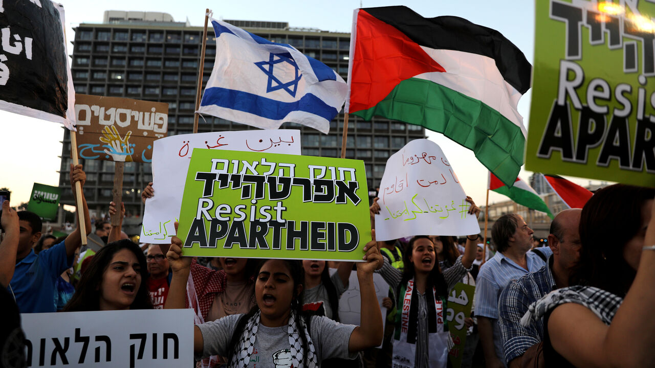 ISRAEL-POLITICS/LAW-PROTESTS Israeli Arabs and their supporters take part in a rally to protest against Jewish nation-state law in Rabin square in Tel Aviv, Israel August 11, 2018. REUTERS/Ammar Awad - RC1DEE0EF780