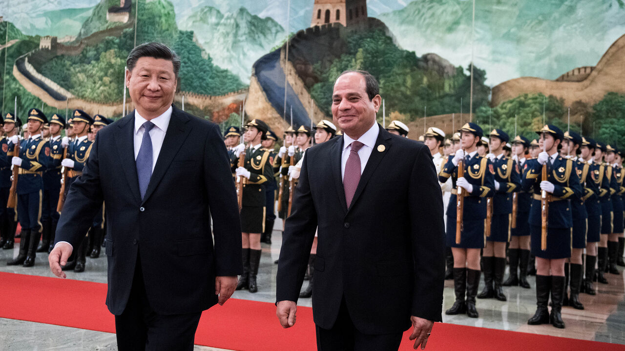 CHINA-AFRICA/EGYPT China's President Xi Jinping and Egyptian President Abdel Fattah al-Sisi stand near the Chinese People's Liberation Army honour guard during a welcome ceremony at the Great Hall of the People in Beijing, China September 1, 2018. Nicolas Asfouri/Pool via REUTERS - RC19352BDE00