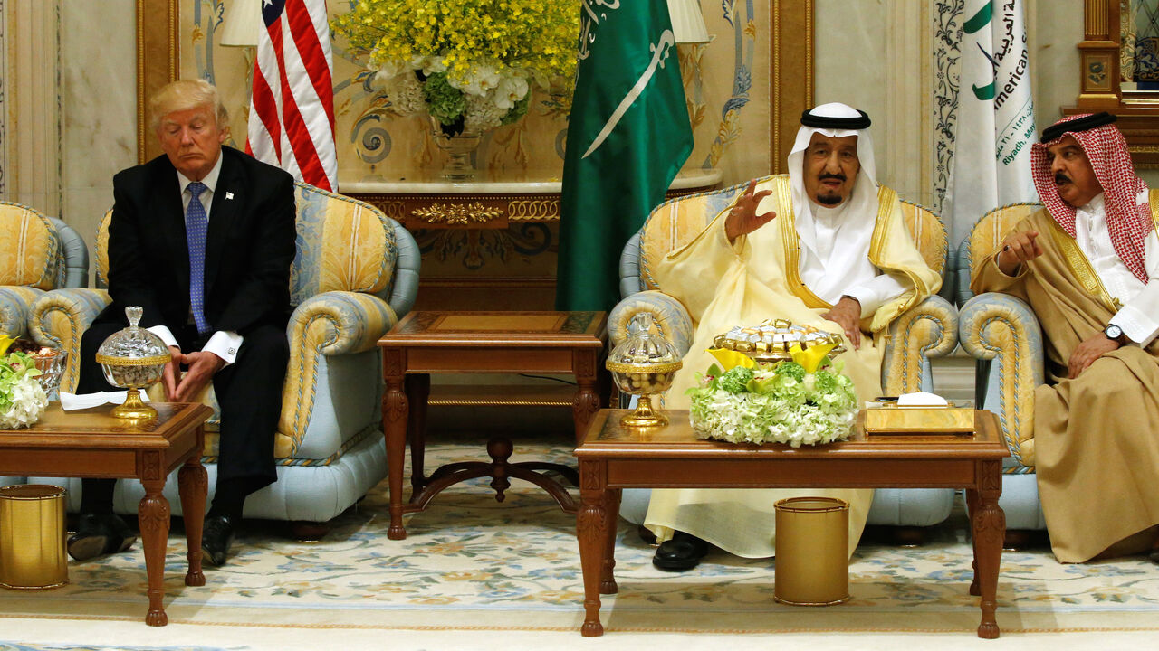 USA-TRUMP/SAUDI U.S. President Donald Trump (L) waits for the start of an event with Saudi Arabia's King Salman bin Abdulaziz Al Saud (2-R) and Gulf Cooperation Council leaders at their summit in Riyadh, Saudi Arabia May 21, 2017. REUTERS/Jonathan Ernst - RC17B78F1020