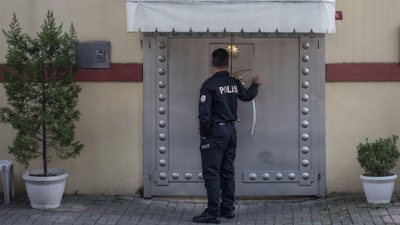 775240875CM003_Focus_Intens ISTANBUL, TURKEY - OCTOBER 10: A police officer providing security waits at the front door of Saudi Arabia's consulate on October 10, 2018 in Istanbul, Turkey. Fears are growing over the fate of missing journalist Jamal Khashoggi after Turkish officials said they believe he was murdered inside the Saudi consulate. Saudi consulate officials have said that missing writer and Saudi critic Jamal Khashoggi went missing after leaving the consulate, however the statement directly contradicts other sources includ