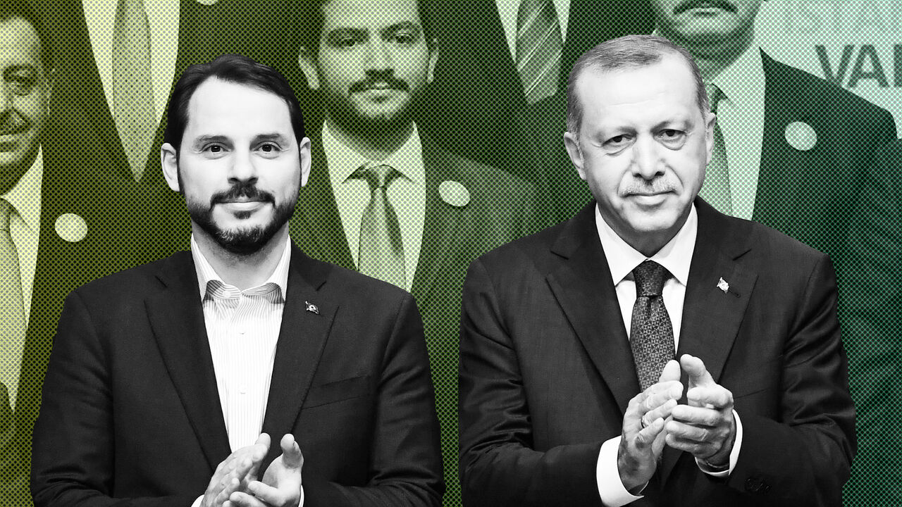 AFP_15G1OH Turkish President Recep Tayyip Erdogan (R) poses with the parliamentary member candidate Turkish Energy Minister Beraat Albayrak (L) on May 29, 2018 in Istanbul during an electoral meeting presenting candidates for the upcoming parliamentary elections. - Turkey holds snap parliamentary and presidential elections on June 24. (Photo by OZAN KOSE / AFP) (Photo credit should read OZAN KOSE/AFP/Getty Images)