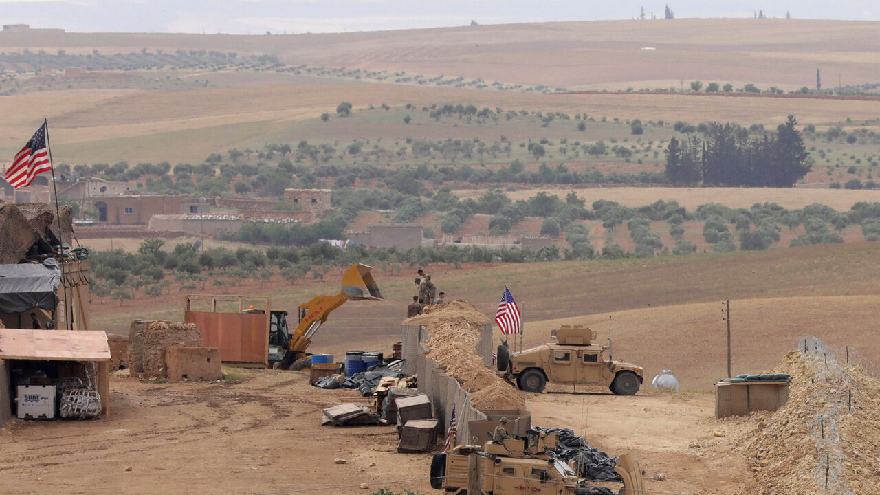 MIDEAST-CRISIS/SYRIA-SDF U.S. forces set up a new base in Manbij, Syria May 8, 2018. Picture Taken May 8, 2018. REUTERS/Rodi Said - RC1306A98B10