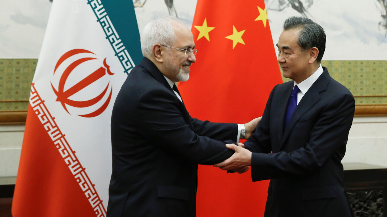 IRAN-NUCLEAR/ZARIF-CHINA Chinese State Councillor and Foreign Minister Wang Yi meets Iranian Foreign Minister Mohammad Javad Zarif at Diaoyutai state guesthouse in Beijing, China May 13, 2018. REUTERS/Thomas Peter - RC1EE6C163D0