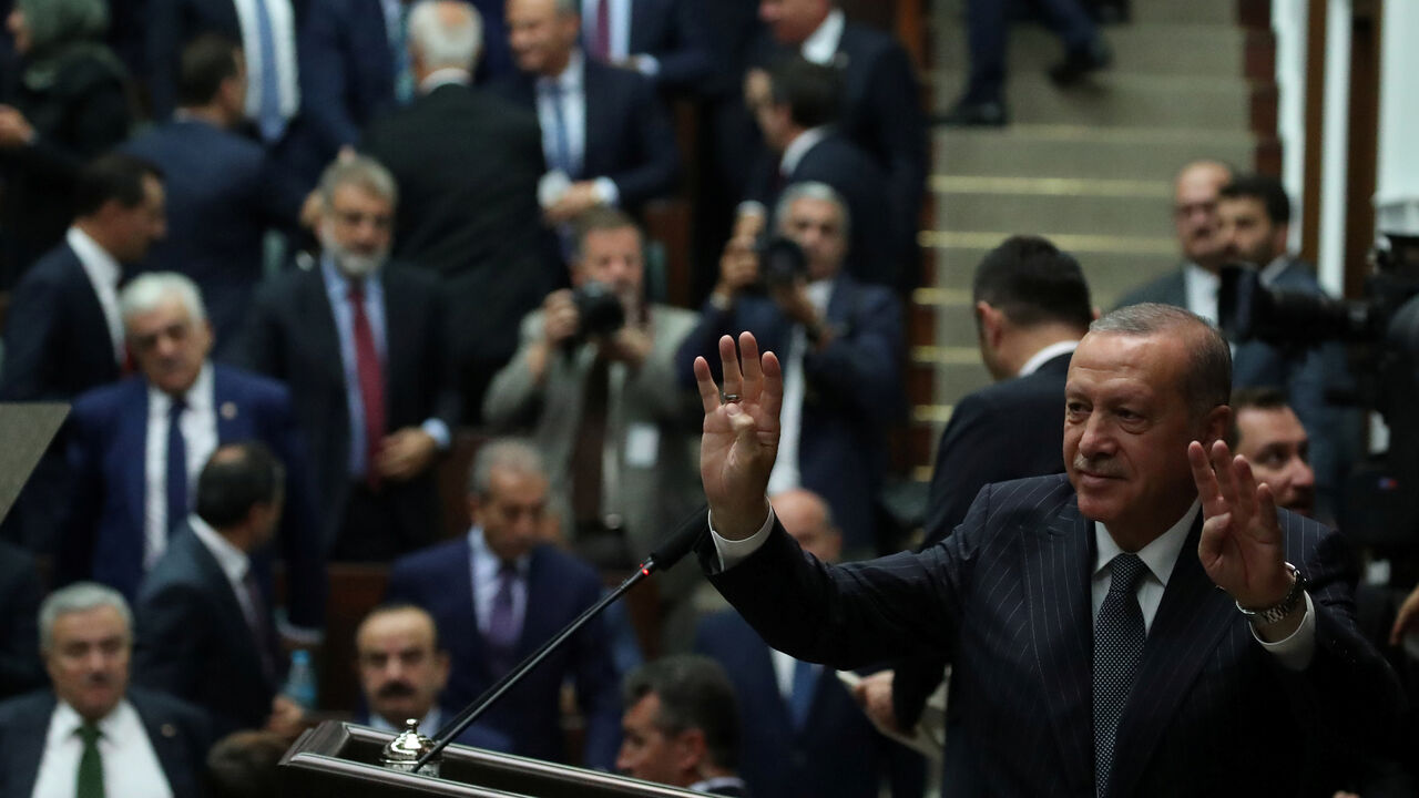 MIDEAST-CRISIS/SYRIA-ERDOGAN Turkish President Tayyip Erdogan greets members of parliament from his ruling AK Party (AKP) during a meeting at the Turkish parliament in Ankara, Turkey, October 2, 2018. REUTERS/Umit Bektas - RC18F32A2FE0