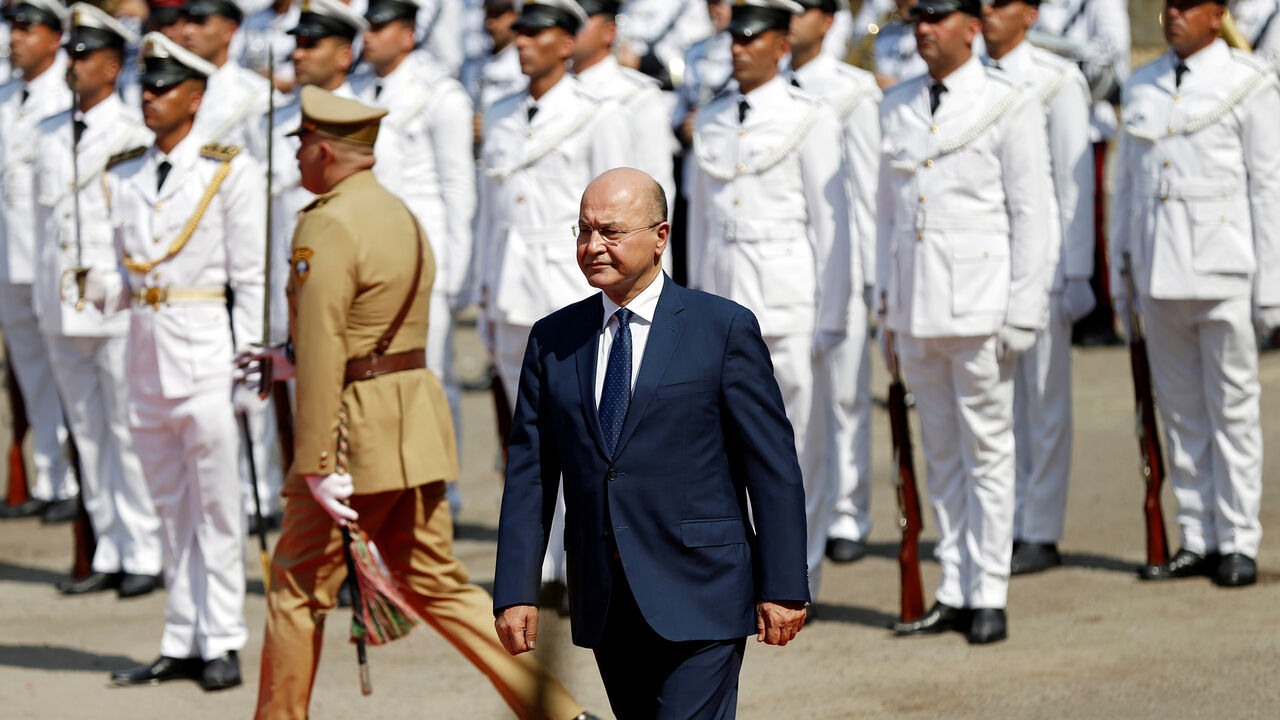 IRAQ-POLITICS/ Barham Salih, Iraq's newly elected President walks during a handover ceremony at Salam Palace in Baghdad, Iraq October 3, 2018. REUTERS/Thaier Al-Sudani - RC1B3C02FD00