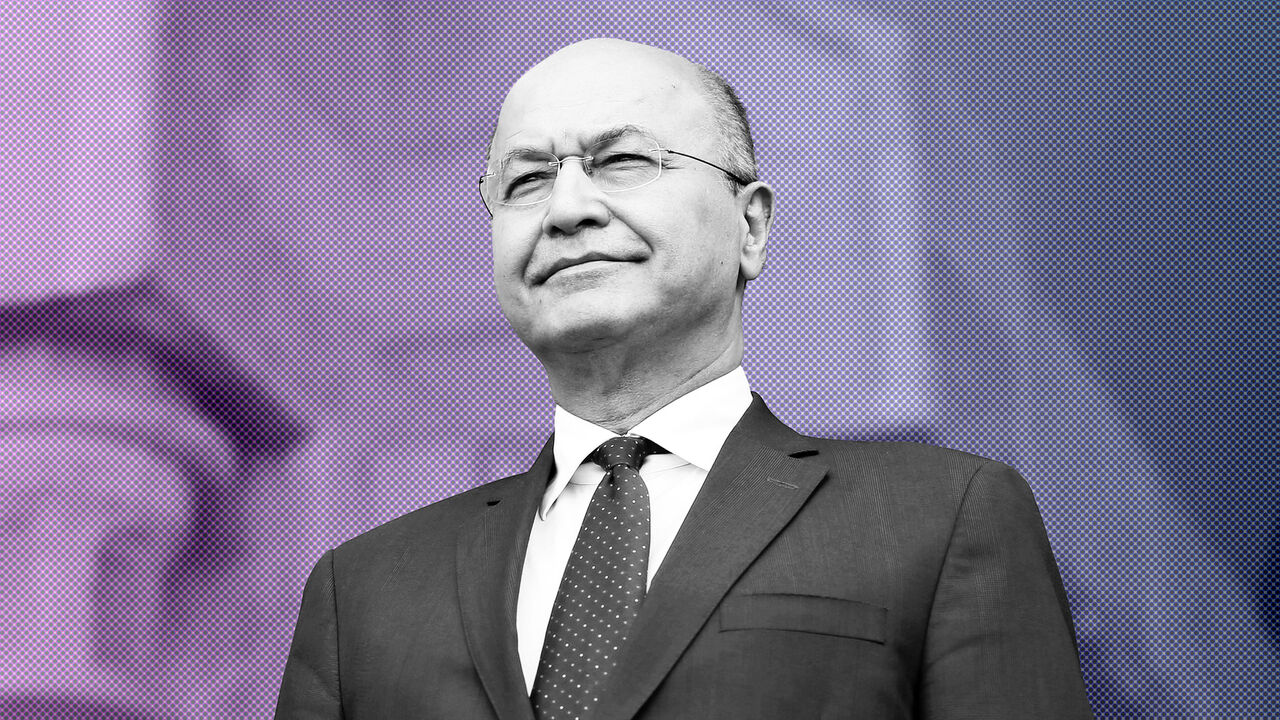 IRAQ-POLITICS/ Barham Salih, Iraq's newly elected President stands during a handover ceremony at Salam Palace in Baghdad, Iraq October 3, 2018. REUTERS/Thaier Al-Sudani - RC1F1E655F20