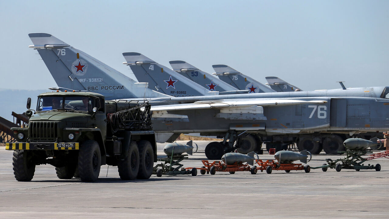 MIDEAST-CRISIS/SYRIA-RUSSIA Russian military jets are seen at Hmeymim air base in Syria, June 18, 2016. Picture taken June 18, 2016. REUTERS/Vadim Savitsky/Russian Defense Ministry via Reuters ATTENTION EDITORS - THIS IMAGE WAS PROVIDED BY A THIRD PARTY. EDITORIAL USE ONLY. - S1AETKWCWFAA