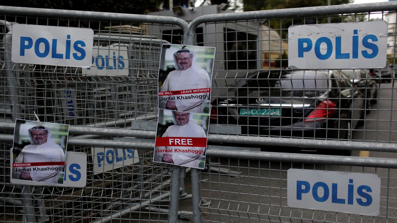 Pictures of Saudi journalist Khashoggi are placed on security barriers during a protest outside the Saudi Consulate in Istanbul Pictures of Saudi journalist Khashoggi are placed on security barriers during a protest outside the Saudi Consulate in Istanbul, Turkey October 8, 2018. REUTERS/Murad Sezer - RC1FD8B03460