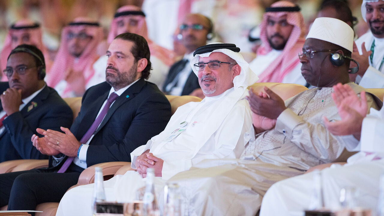 SAUDI-INVESTMENT/ Bahrain's Crown Prince Salman bin Hamad al-Khalifa, Senegal's President Macky Sall and Lebanese Prime Minister Saad al-Hariri attend the Future Investment Initiative Forum in Riyadh, Saudi Arabia October 24, 2018. Bandar Algaloud/Courtesy of Saudi Royal Court/Handout via REUTERS ATTENTION EDITORS - THIS PICTURE WAS PROVIDED BY A THIRD PARTY. - RC12E74599F0