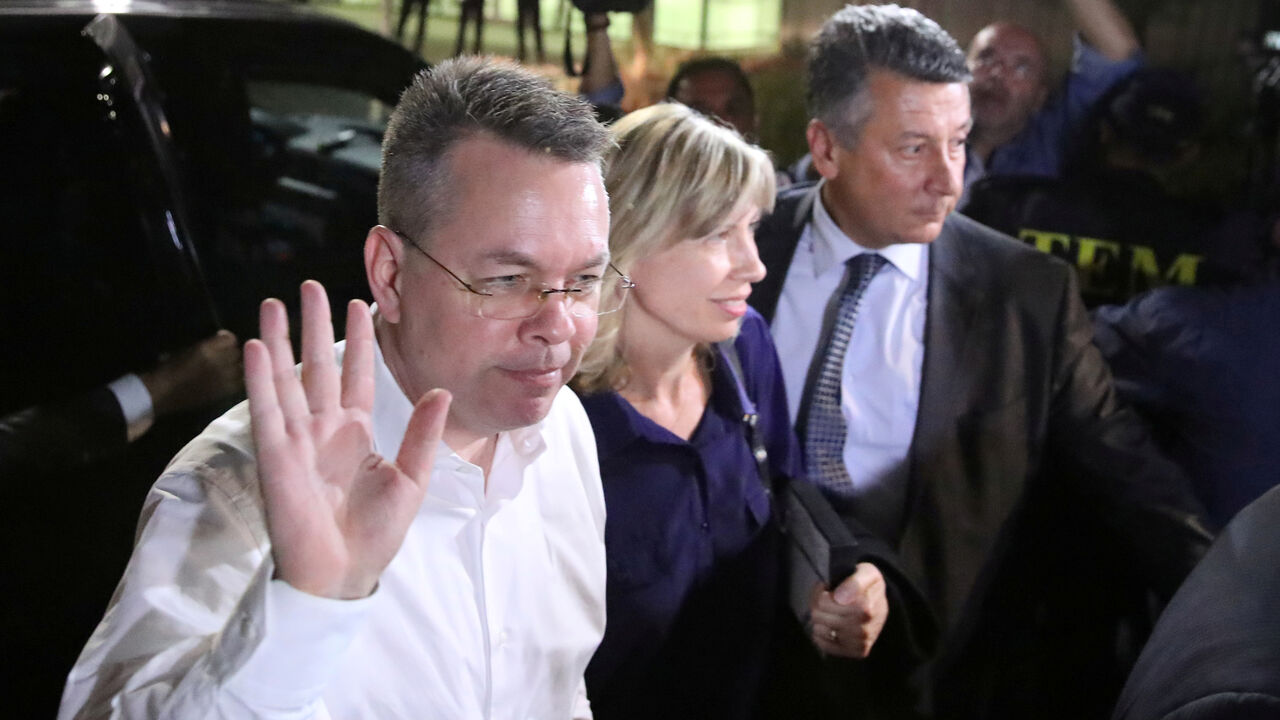 TURKEY-SECURITY/USA U.S. pastor Andrew Brunson and his wife Norrine arrive at the airport in Izmir, Turkey October 12, 2018. REUTERS/Umit Bektas TPX IMAGES OF THE DAY - RC1968B6D160