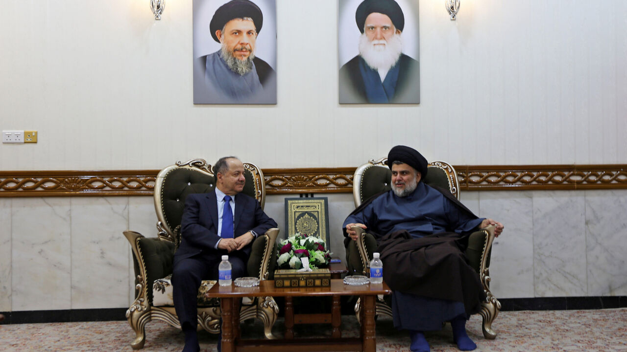 Former Iraqi Kurdish region President Masoud Barzani meets with Iraqi Shi'ite radical leader Muqtada al-Sadr in Najaf, Iraq November 23, 2018. REUTERS/Alaa al-Marjani - RC180BA2F8F0