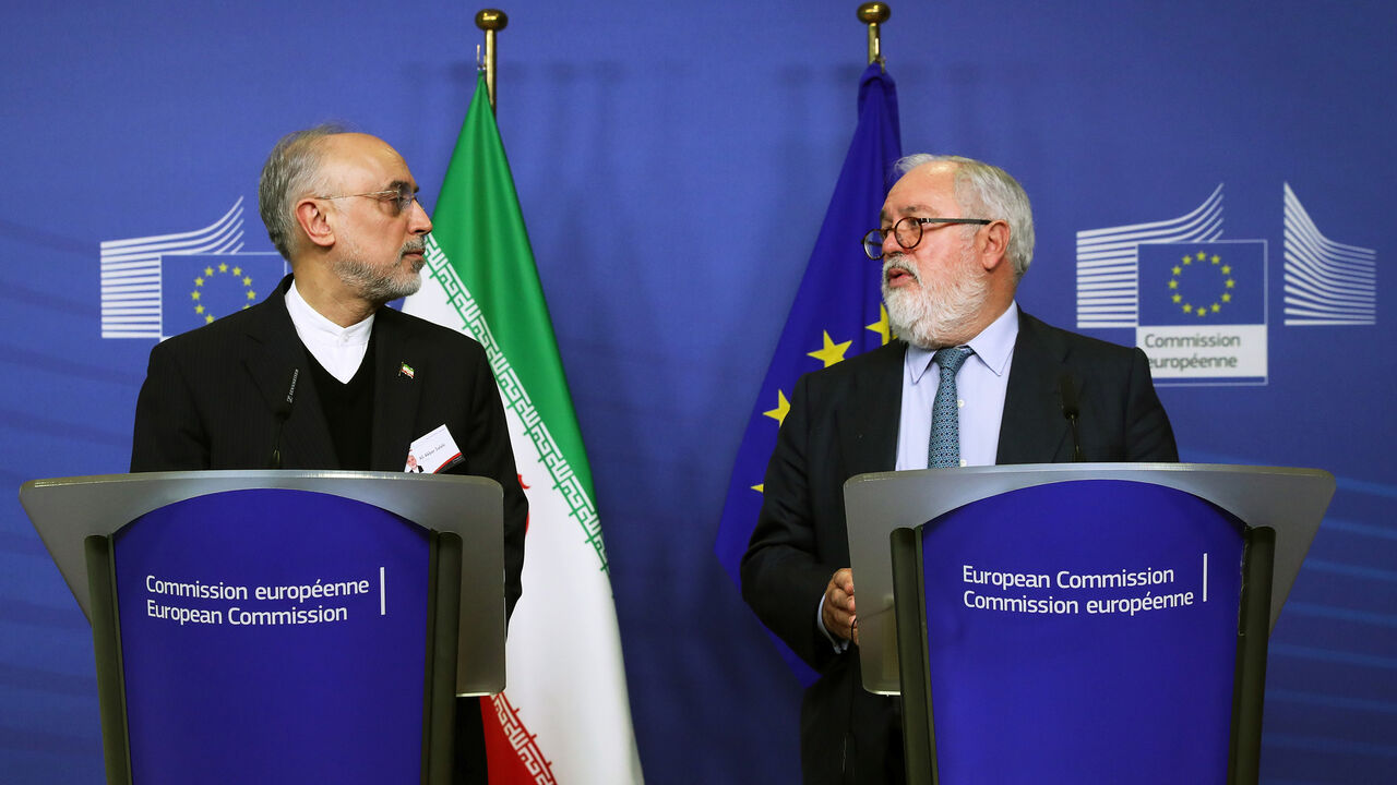 EU Energy Commissioner Miguel Arias Canete and Iran's nuclear chief Ali Akbar Salehi hold a joint news conference at the EC headquarters in Brussels, Belgium November 26, 2018.  REUTERS/Yves Herman - RC11C823E6B0