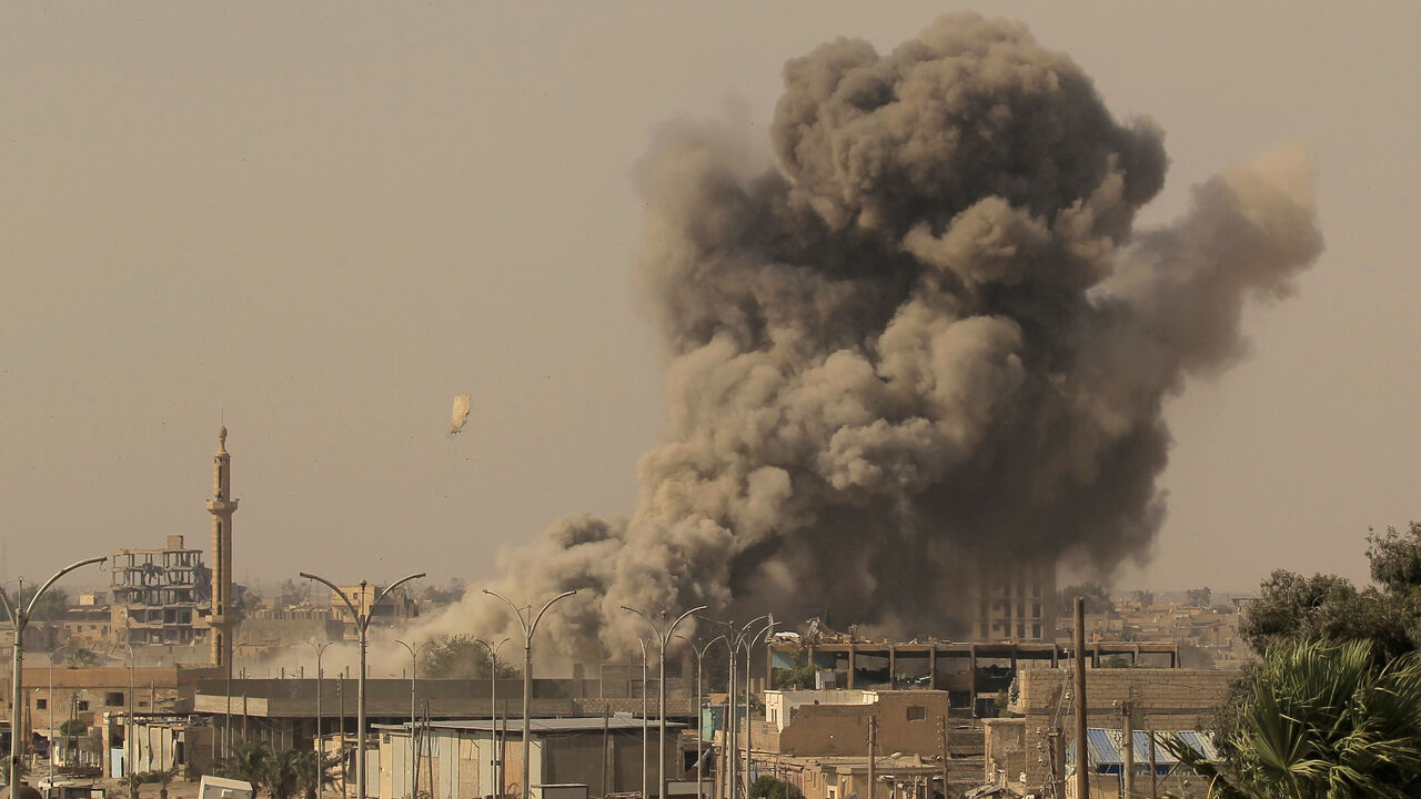 GLOBAL-POY/ISLAMIC-STATE Smoke rises after an air strike during fighting between members of the Syrian Democratic Forces and Islamic State militants in Raqqa, Syria, August 15, 2017. Zohra Bensemra: "Access to the frontline of the battle for Raqqa in Syria was more limited than during the battle for Mosul in Iraq. Raqqa’s battle was different also from Mosul’s because we saw very few civilians who managed to escape. We didn’t have daily access. We were often posted in buildings used as a command base or observation point. From ther