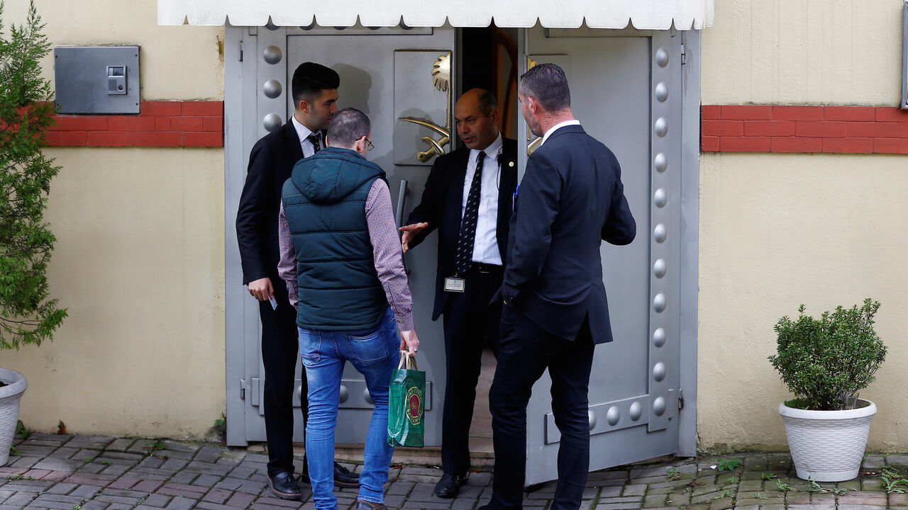 SAUDI-KHASHOGGI/TURKEY A man enters to Saudi Arabia's consulate as security officers stand at the entrance in Istanbul, Turkey October 31, 2018. REUTERS/Osman Orsal - RC1D19130020