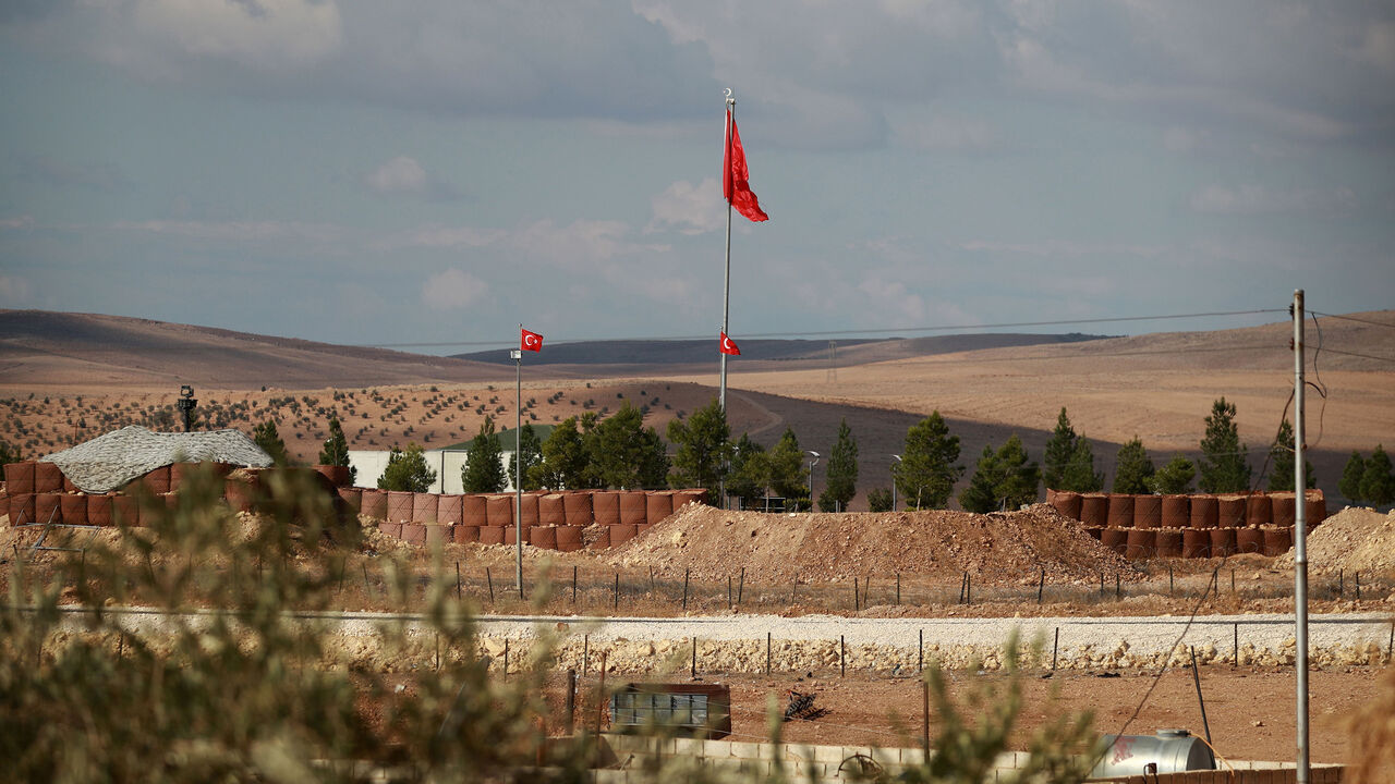 AFP_1AO4SS A general view shows Turkish flags fluttering at a military post in the village of Ashma in the Kurdish region of Kobane in northern Syria on November 8, 2018. - In recent days, cross-border Turkish artillery fire has targeted positions held by the People's Protection Units (YPG), the main Kurdish militia in Syria. Ankara sees the de-facto autonomous rule set up by Syrian Kurds as an encouragement to the separatists of the Turkey-based Kurdistan Workers' Party (PKK), which has close ties to the YPG. (Photo