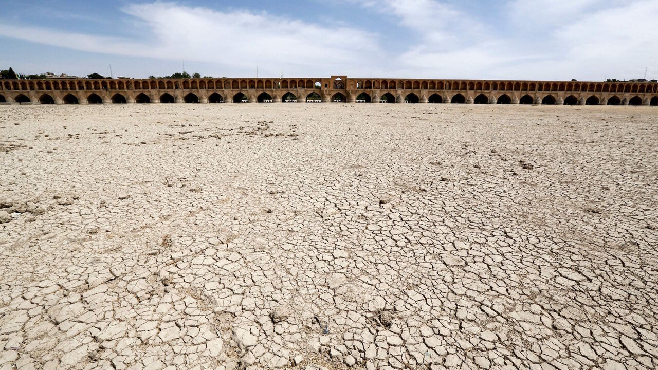 A general view shows the "Si-o-Se Pol" bridge (33 Arches bridge) over the Zayandeh Rud river in Isfahan, which now runs dry due to water extraction before it reaches the city on April 11, 2018. 
The 295 metre long bridge was completed in 1596 by Iranian Safavid king, Shah Abbas the Great (Shah Abbas l).  / AFP PHOTO / ATTA KENARE        (Photo credit should read ATTA KENARE/AFP/Getty Images)