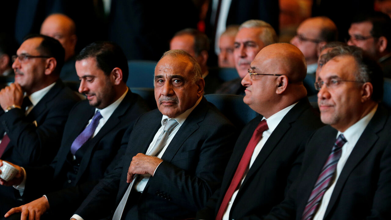 IRAQ-FAIR/ Iraq's Prime Minister Adel Abdul Mahdi (C) attends the opening of Baghdad International Fair, Iraq November 10, 2018. REUTERS/Thaier al-Sudani - RC1C7F323800