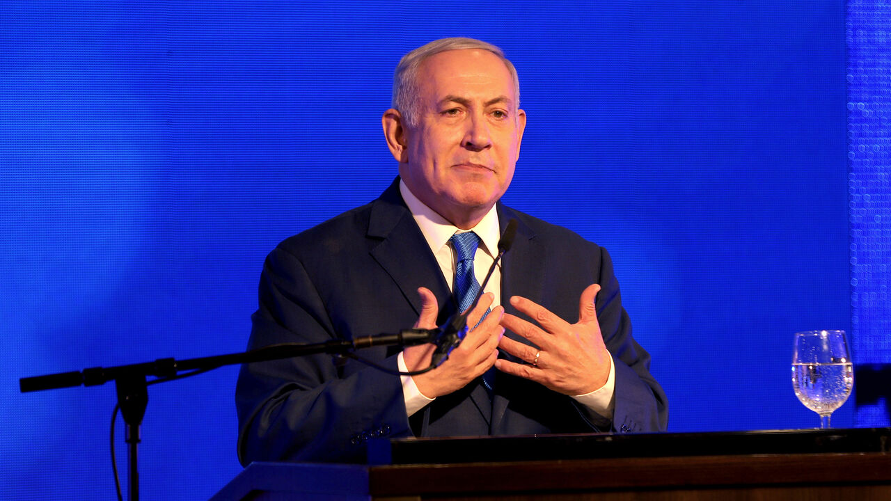 ISRAEL-NETANYAHU/CORRUPTION Israeli Prime Minister Benjamin Netanyahu speaks during an Likud Party gathering marking the first day of the eight-day Jewish holiday of Hanukkah, in Ramat Gan, Israel December 2, 2018. REUTERS/Corinna Kern - RC1881F587D0