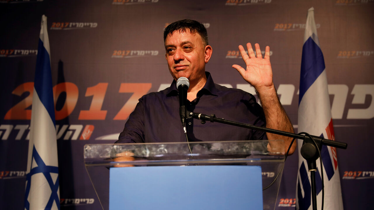 ISRAEL-POLITICS/LABOUR Avi Gabbai, the new leader of Israel's centre-left Labour party, gestures as he delivers his victory speech after winning the Labour party primary runoff, at an event in Tel Aviv, Israel July 10, 2017. REUTERS/Amir Cohen - RC1780888D30
